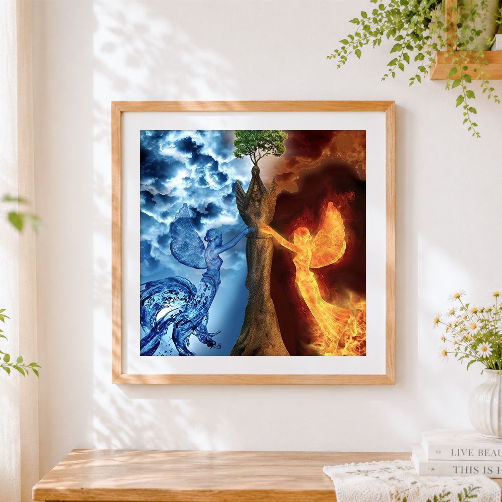 Finished water and fire angels cross stitch artwork displayed