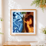 Finished water and fire angels cross stitch artwork displayed