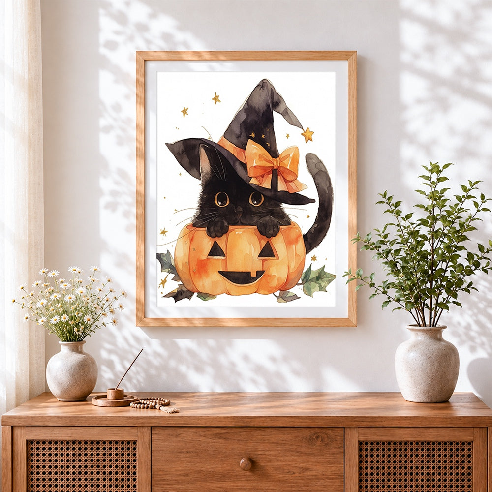Finished watercolour black cat in pumpkin cross stitch artwork displayed