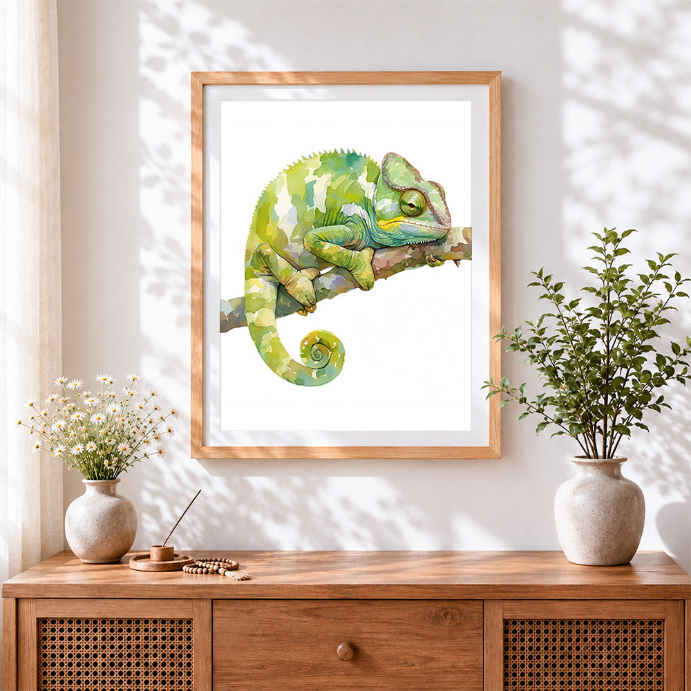 Finished watercolour chameleon cross stitch artwork displayed
