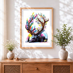 Finished watercolour deer with floral antlers cross stitch artwork displayed