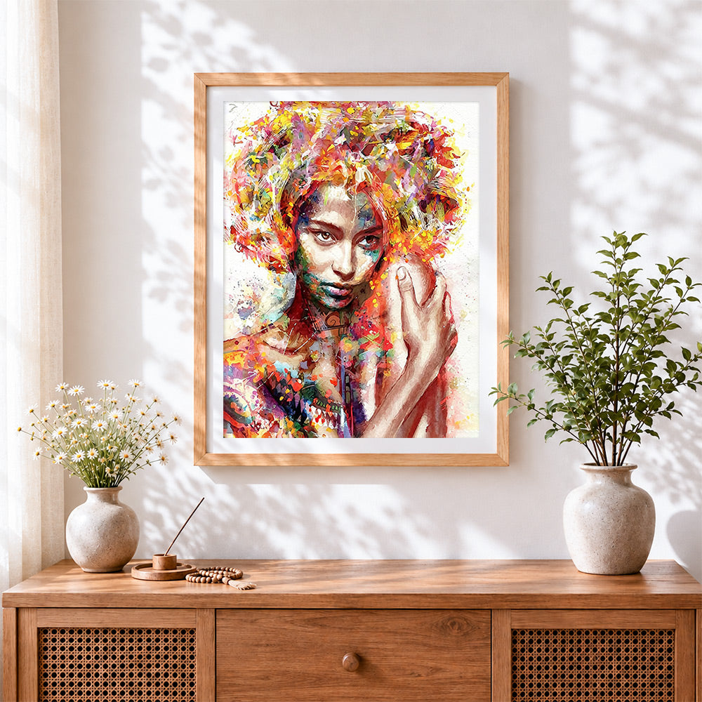 Finished watercolour floral afro woman cross stitch artwork displayed