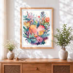 Finished watercolour floral heart cross stitch artwork displayed