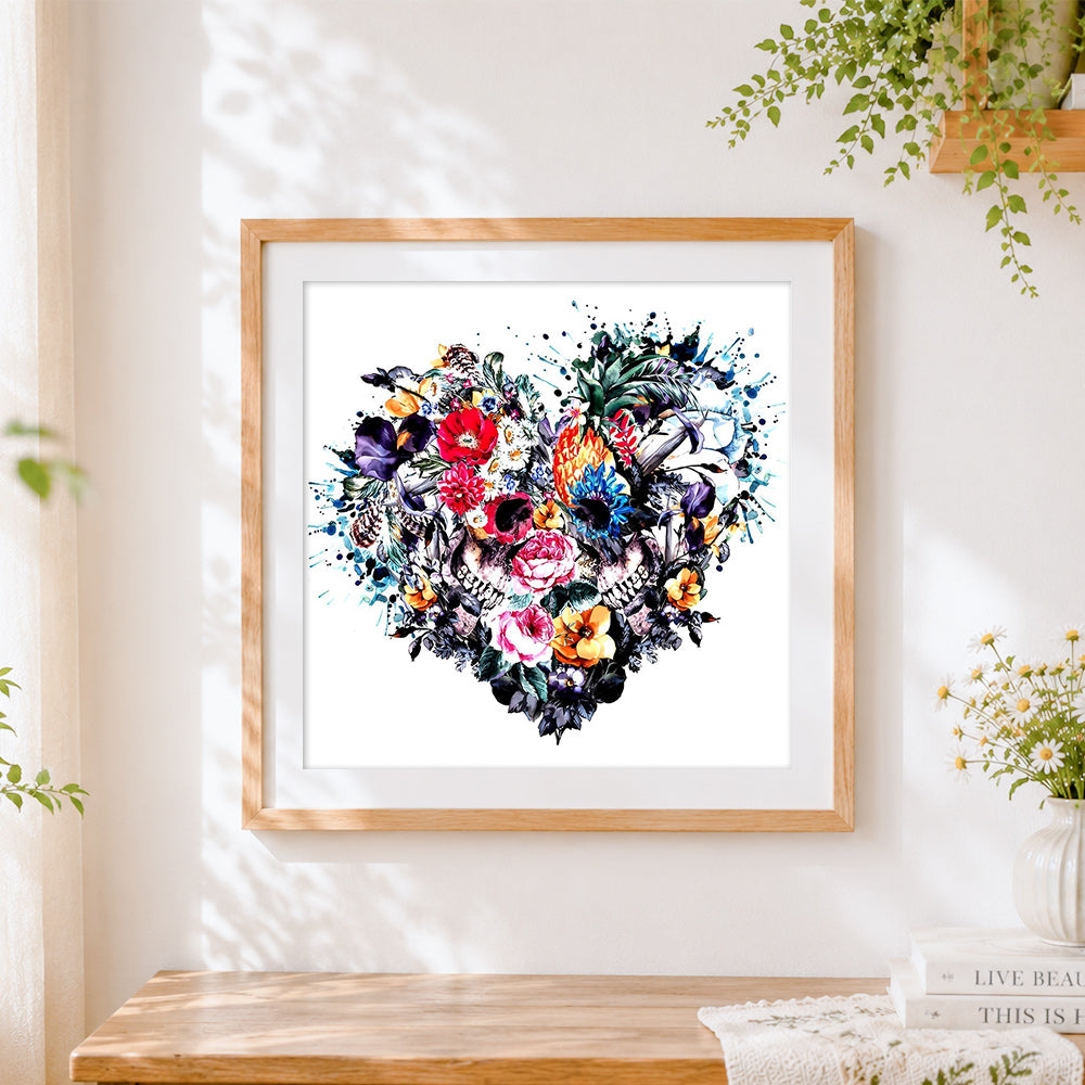 Finished watercolour floral heart skulls cross stitch artwork displayed