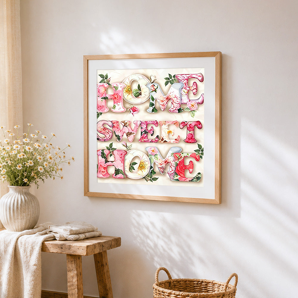 Watercolour floral home sweet home print cross stitch artwork displayed on wall as home decor