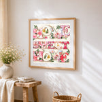 Watercolour floral home sweet home print cross stitch artwork displayed on wall as home decor