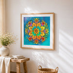 Watercolour floral mandala cross stitch artwork displayed on wall as home decor