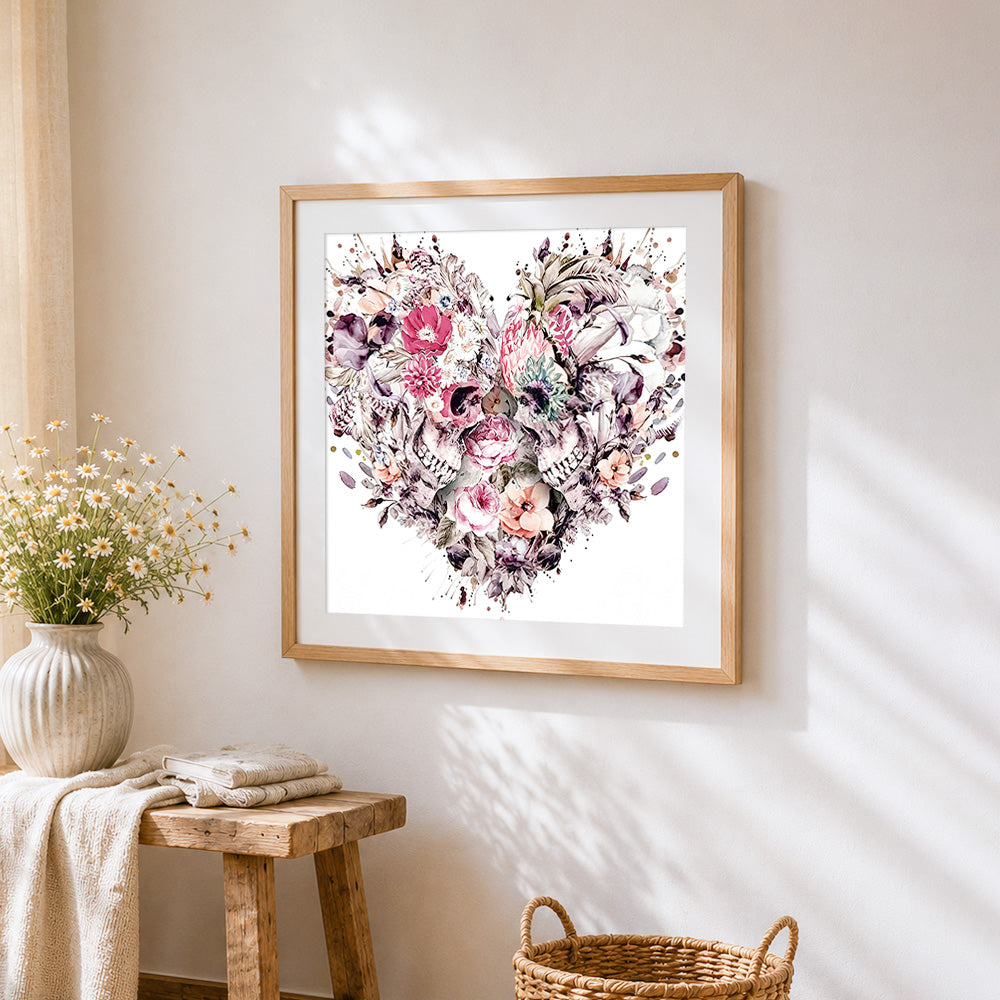 Watercolour floral skulls cross stitch artwork displayed on wall as home decor