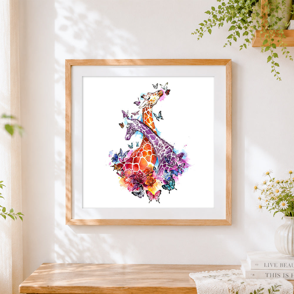 Finished watercolour giraffes and butterflies cross stitch artwork displayed