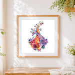 Finished watercolour giraffes and butterflies cross stitch artwork displayed