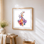 Watercolour giraffes and butterflies cross stitch artwork displayed on wall as home decor
