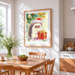 Watercolour hedgehog with christmas gift cross stitch artwork displayed on wall as home decor