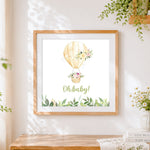 Finished watercolour hot air balloon cross stitch artwork displayed