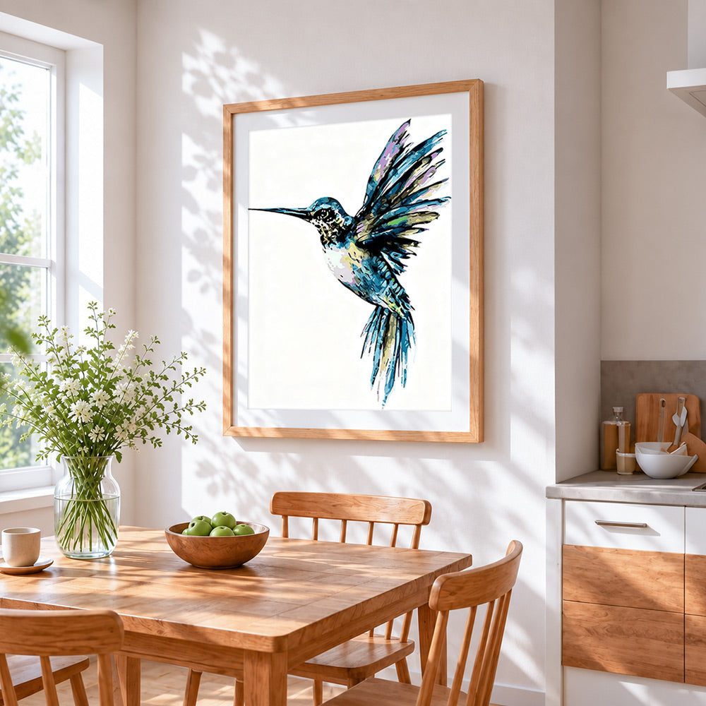 Watercolour hummingbird cross stitch artwork displayed on wall as home decor