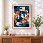 Finished watercolour koi fish cross stitch artwork displayed