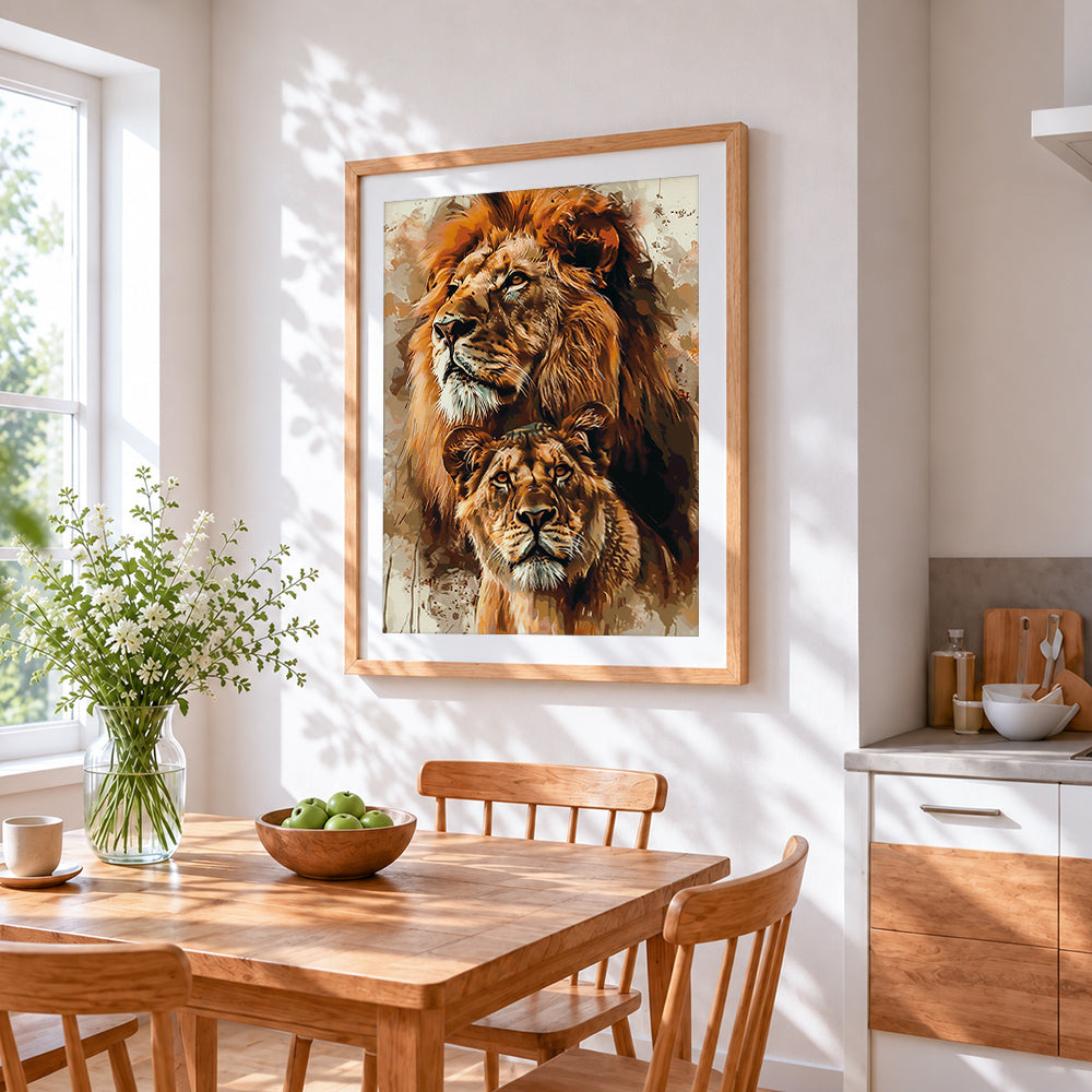 Watercolour lion and lioness portrait cross stitch artwork displayed on wall as home decor