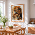 Watercolour lion and lioness portrait cross stitch artwork displayed on wall as home decor