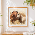 Finished watercolour pair of horses cross stitch artwork displayed