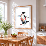 Watercolour penguin cross stitch artwork displayed on wall as home decor