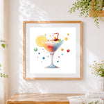 Finished watercolour rainbow cocktail cross stitch artwork displayed