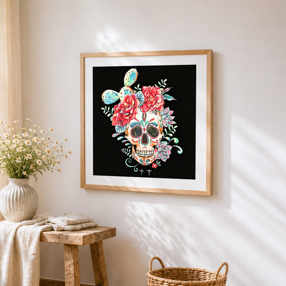 Watercolour skull with cacti and flowers cross stitch artwork displayed on wall as home decor