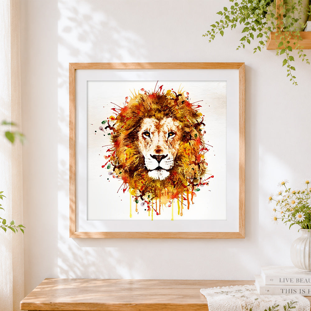 Finished watercolour splatter lion cross stitch artwork displayed