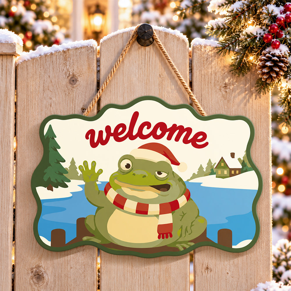 Waving frog holiday paint by numbers door hanger on a garden gate