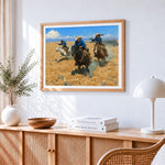 Western cowboys on horseback cross stitch artwork displayed on wall as home decor