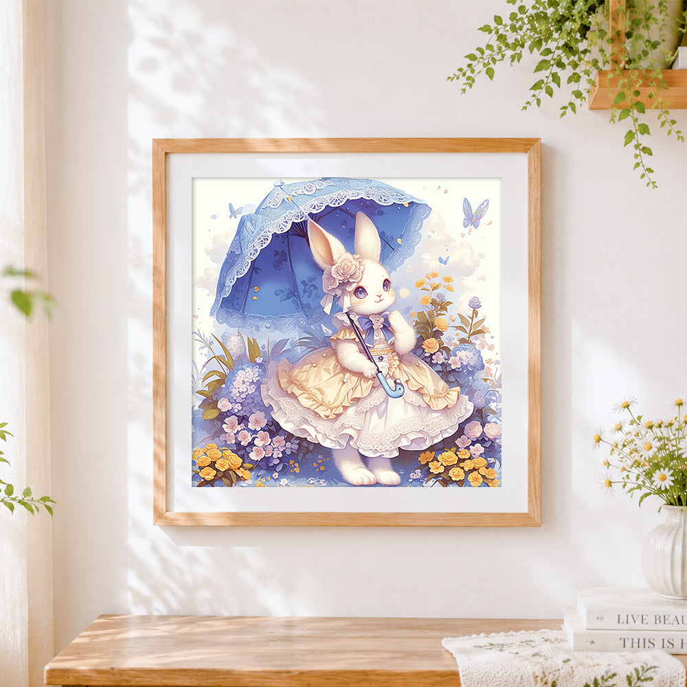 Finished whimsical bunny in a lace dress cross stitch artwork displayed
