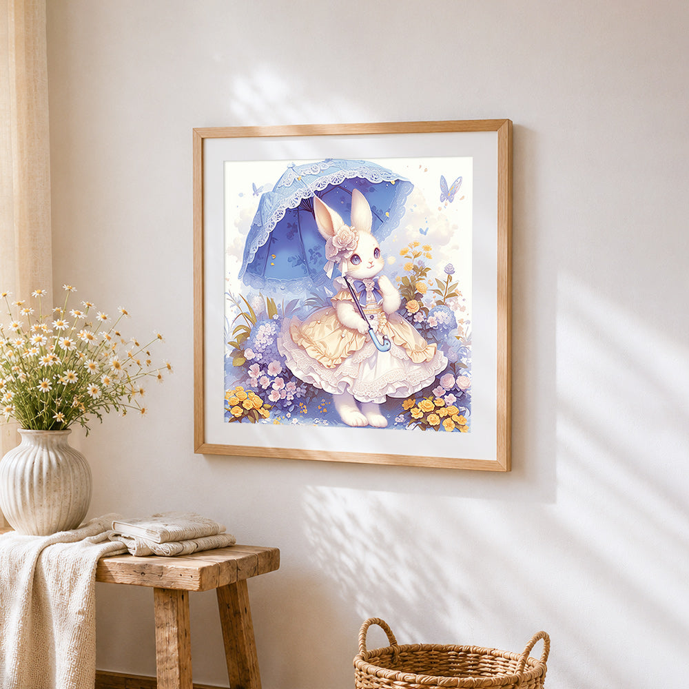 Whimsical bunny in a lace dress cross stitch artwork displayed on wall as home decor