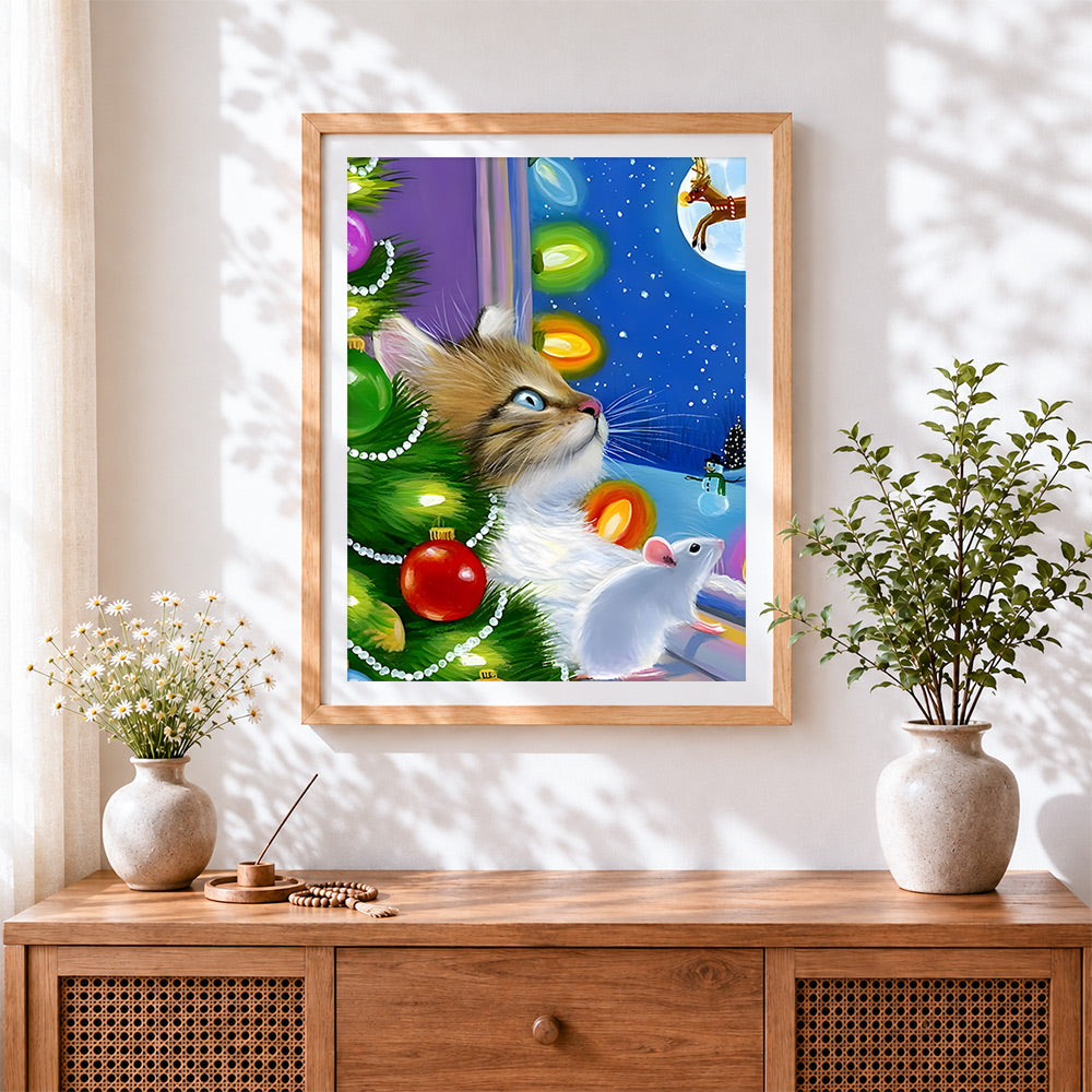 Finished whimsical cat and mouse by a christmas tree cross stitch artwork displayed