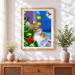 Finished whimsical cat and mouse by a christmas tree cross stitch artwork displayed