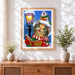 Finished whimsical cat and mouse singing christmas carols cross stitch artwork displayed