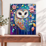 Finished whimsical colourful owl pearl diamond painting artwork displayed as home decor