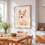 Whimsical deer with flower crown cross stitch artwork displayed on wall as home decor