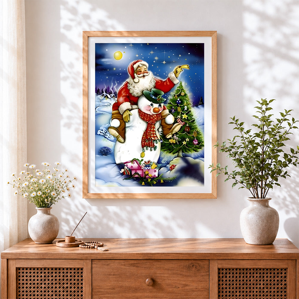 Finished whimsical santa and snowman cross stitch artwork displayed