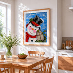 Whimsical snowman and owl in the snow cross stitch artwork displayed on wall as home decor