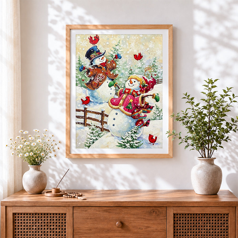 Finished whimsical snowmen in winter coats cross stitch artwork displayed