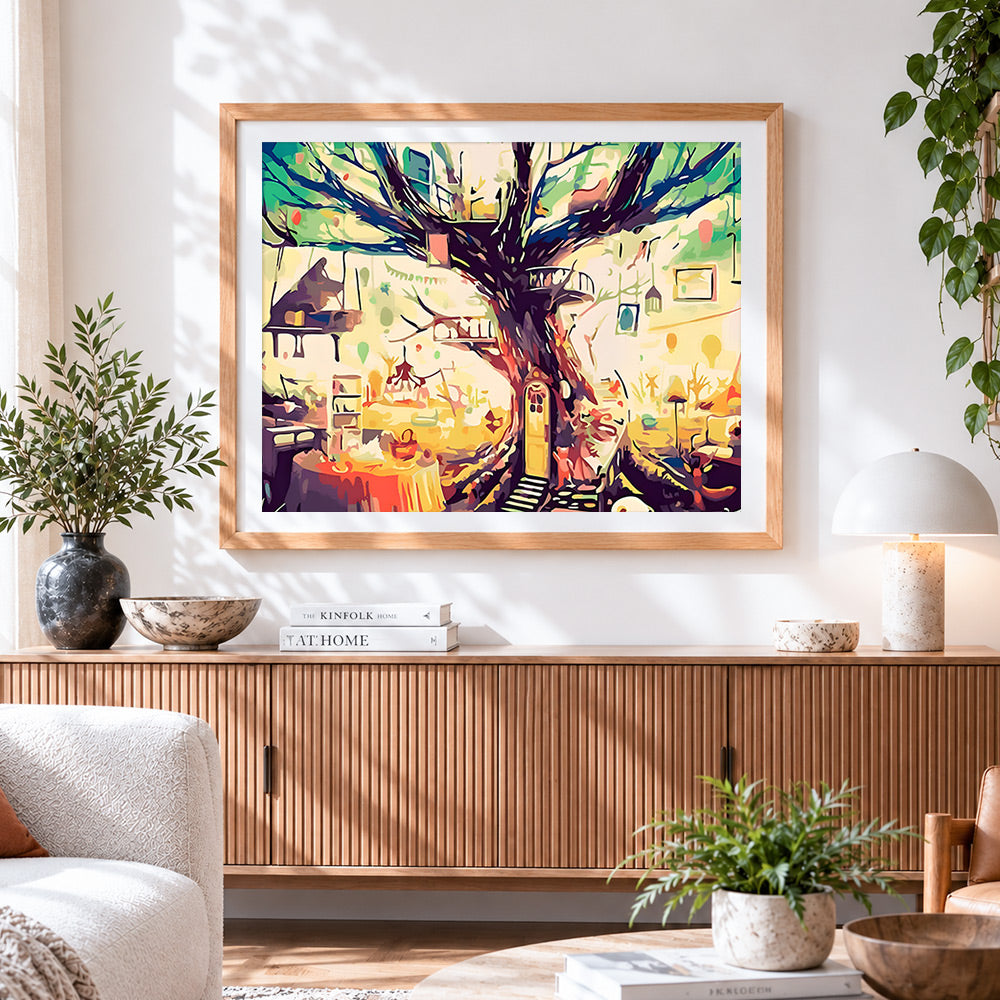 Finished whimsical treehouse interior cross stitch artwork displayed