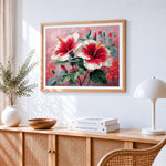 White and red hibiscus paint by numbers artwork displayed on wall as home decor
