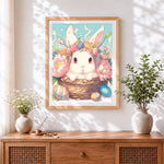 Finished white bunny in a basket with flowers cross stitch artwork displayed