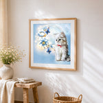 White cat with blue flowers cross stitch artwork displayed on wall as home decor