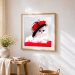 White cat with red hat cross stitch artwork displayed on wall as home decor