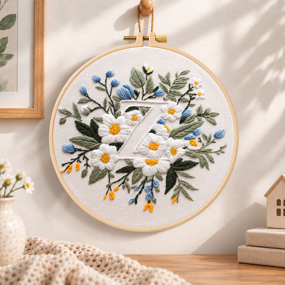 White daisies and letter z embroidery hoop wall art displayed as warm and cosy handmade home decor