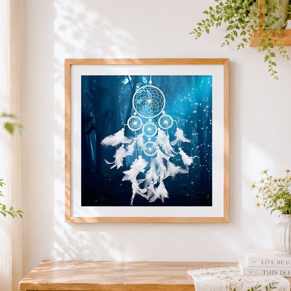Finished white dreamcatcher in enchanted forest cross stitch artwork displayed