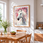 White horse and cherry blossom cross stitch artwork displayed on wall as home decor
