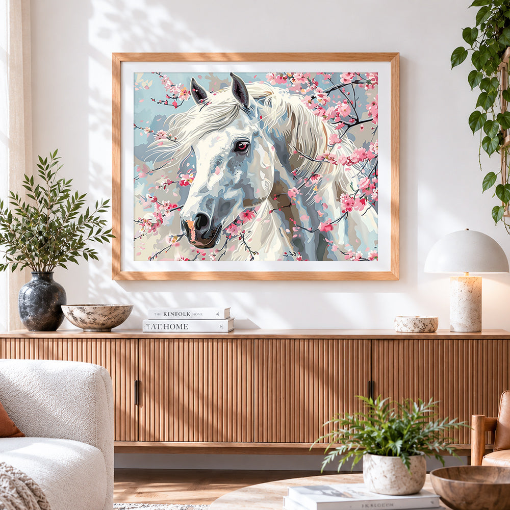 Finished white horse with cherry blossoms paint by numbers artwork displayed as home decor
