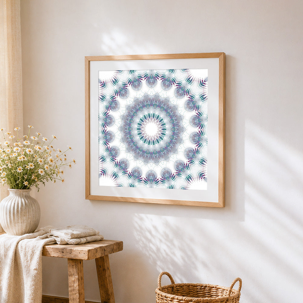White kaleidoscope mandala cross stitch artwork displayed on wall as home decor