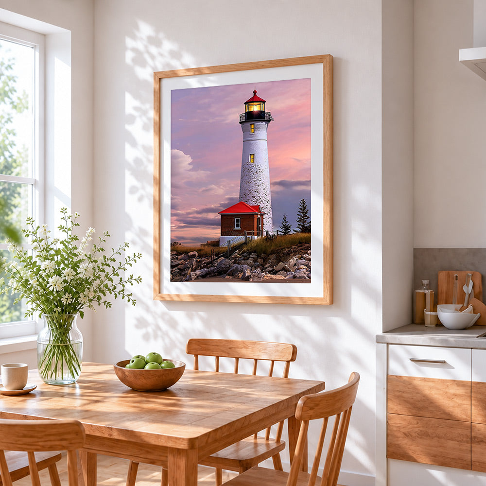 White lighthouse under the pink and purple sky paint by numbers artwork displayed on wall as home decor