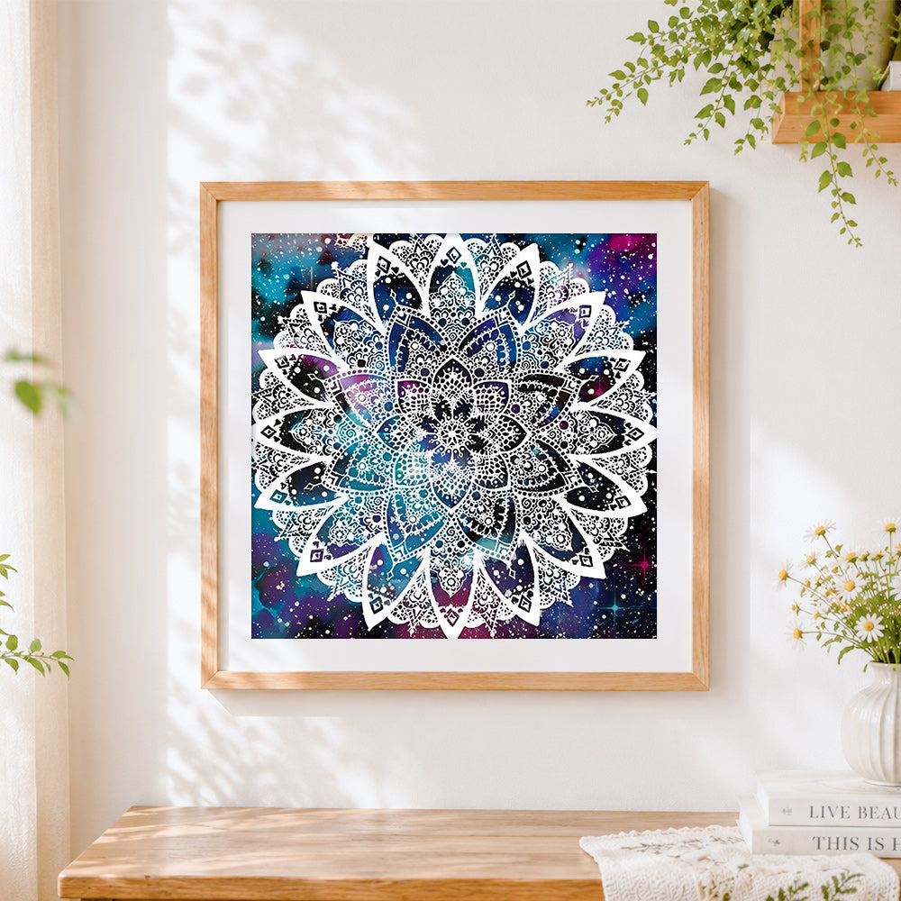 Finished white mandala on galaxy background cross stitch artwork displayed